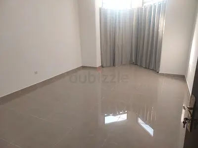 Hamdan St ladies only large, quiet, clean, bright room shared bthrm