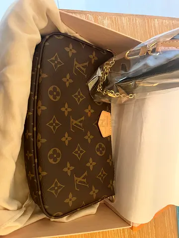 Brand new Louis Vuitton multi pocket bag