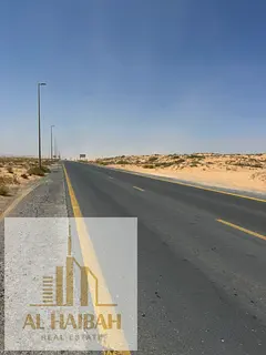 For sale: Two adjacent plots of land in Sharjah, Muzeirah area, excellent location and price.