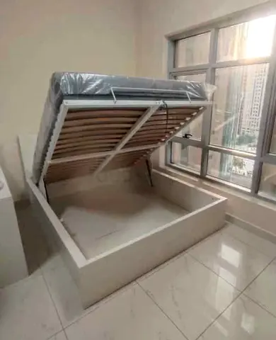 Ikea king size hydraulic bed with Ikea mattress  ‎