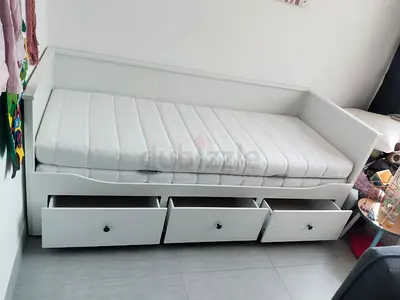 IKEA Hamnes Day bed with 3 storage drawers underneath and with 2 IKEA mattresses is available