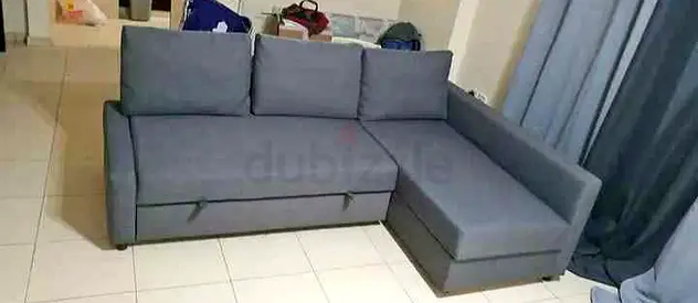 Ikea L Shape Sofa cum bed with big storage in L