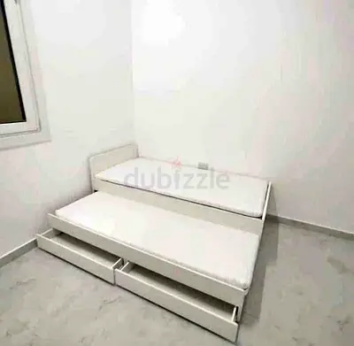 Ikea slakt bed frame with under bed and 2 storage drawers underneath with 2 Ikea mattresses