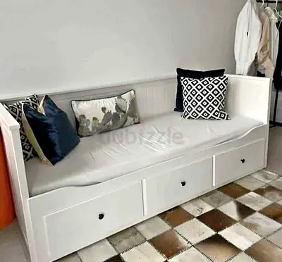 IKEA hamness Day bed with 3 storage drawers underneath and with 2 IKEA mattresses