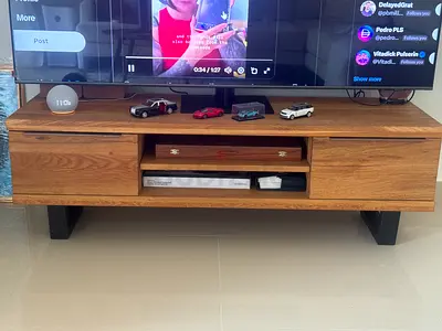Stylish Wooden TV Unit with Ample Storage