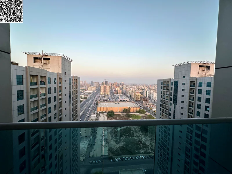 Cheapest 2BR hall in Ajman with free parking & open balcony offering full panoramic city views. Modern, stylish finishes in a prime location near all64410798311811110