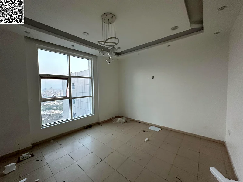 Cheapest 2BR hall in Ajman with free parking & open balcony offering full panoramic city views. Modern, stylish finishes in a prime location near all64410798311811111