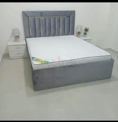 Stylish Grey Bed with Nightstands - Perfect for Modern Bedrooms!