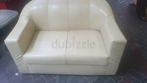 Stylish Beige Leather Loveseat for Sale