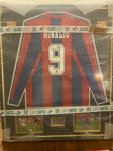 The iconic Ronaldo R9 personally signed Barça jersey
