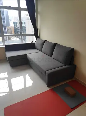 Ikea L Shape Sofa cum bed with big storage in L