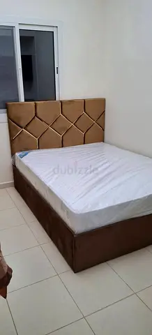 Stylish Queen Size Bed with Elegant Headboard