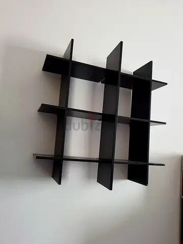 wall mounted black shelf transforms into different styles IKEA