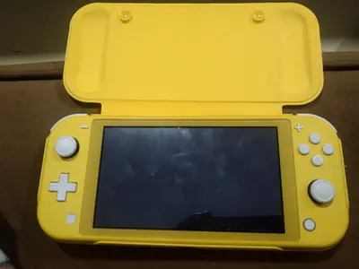 Bright Yellow Nintendo Switch Lite for Gaming Enthusiasts 1 tera full new games