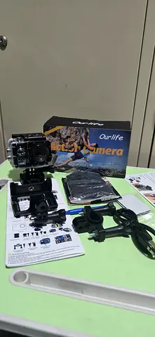 Compact digital action camera