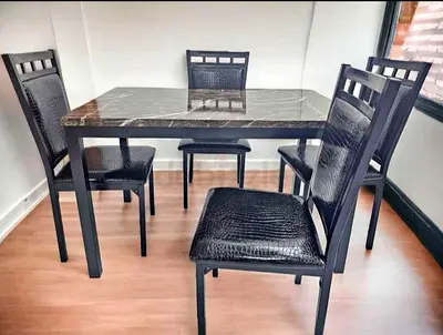 Brand new dining table with 4 chair available
