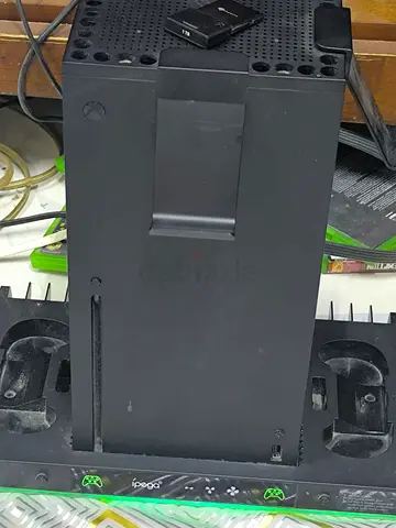 Xbox Series X with 4 Controllers  2Seagate Expansion cards  XBOX Wireless Headphone and 4Games