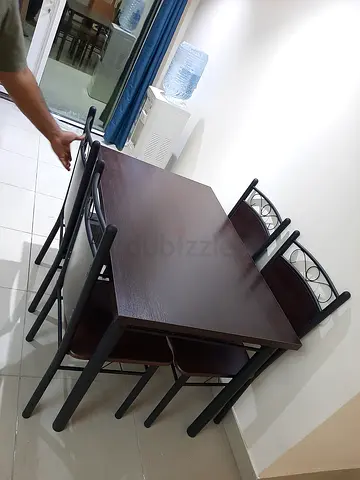 Brand new dining table with 4 chair available