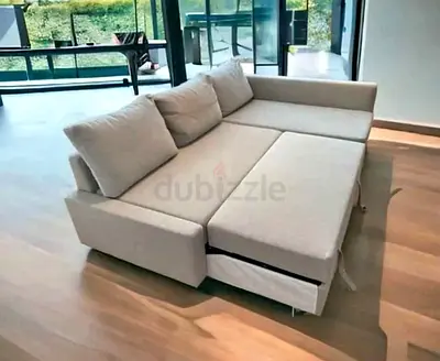 Ikea L Shape Sofa cum bed with big storage in L