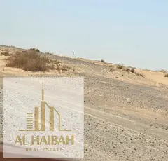 Distinctive residential land for sale in Sharjah - Al Matraq    A golden opportunity to own a corner