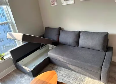 Ikea L Shape Sofa cum bed with big storage in L