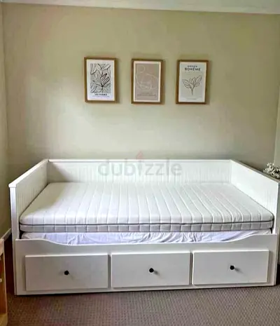 IKEA hamness Day bed with 3 storage drawers underneath and with 2 IKEA mattresses