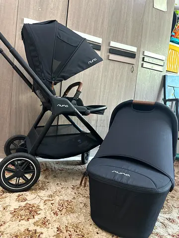 Nuna triv next stroller with bassinet and adapter in new condition