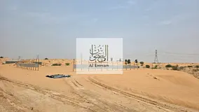 For sale, industrial land in Al Qasimia 4, area 12,000 square feet