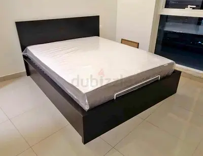Ikea queen size hydraulic bed with Ikea mattress  ‎