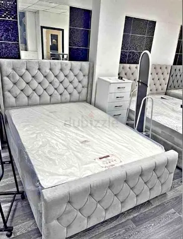Elegant Queen Size Bed with Plush Upholstery