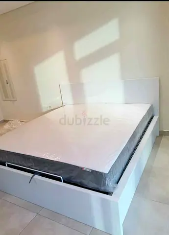 Ikea queen size hydraulic bed with Ikea mattress  ‎