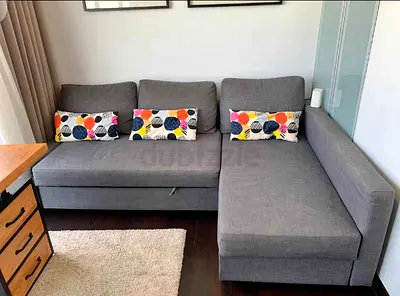 Ikea L Shape Sofa cum bed with big storage in L