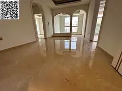 The largest and most elegant two-bedroom apartment, with a hall and a sitting room in Al Muwaihat 3,