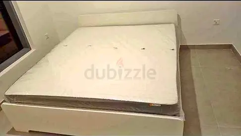 Ikea king size askovol bed frame and Ikea mattress