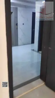 For annual rent in Ajman, a room and a hall in Rashid Yan Building in Al Alia area. Required: 28,000