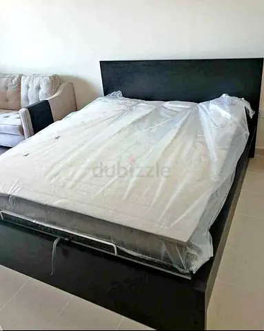 Ikea king size hydraulic bed with Ikea mattress