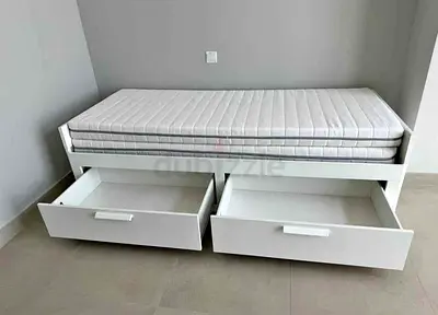 IKEA brimness Day bed with 2 storage drawers underneath and with 2 IKEA mattresses