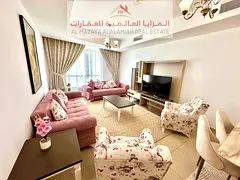 Monthly - Two rooms and a hall - Al Taawun -BEACH TOWER 2- Deluxe furniture - With internet -3 bathr