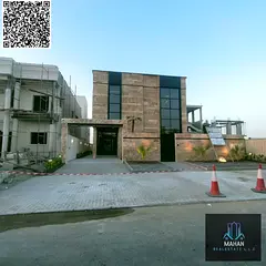 Luxury Villa – Al Alia Area Stone façade with a modern entrance, outdoor and indoor landscaping. 