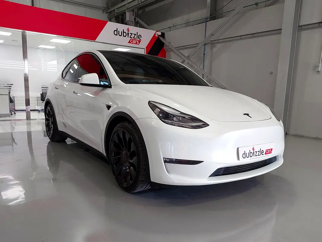 Tesla Model Y 2024 — photo 1 of 16