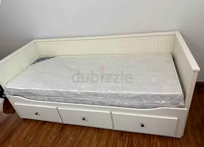 IKEA hamness Day bed with 3 storage drawers underneath and with 2 IKEA mattresses