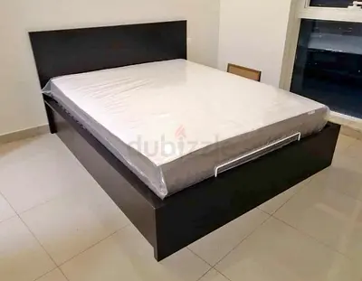 Ikea king size hydraulic bed with Ikea mattress  ‎