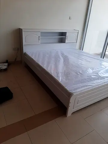 Brand new queen size bed with mattress