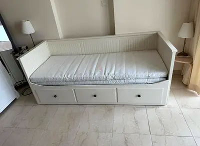 IKEA Hamnes Day bed with 3 storage drawers underneath and with 2 IKEA mattresses