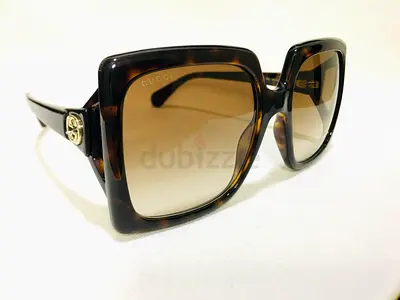 Stylish Gucci Sunglasses - Elevate Your Look!