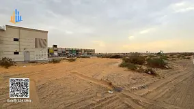 For sale, an investment plot on Al Zahia Roundabout | To build a building - (ground floor + two f