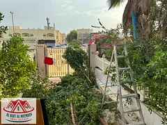 Residential and commercial corner villa on the main street in Al Fayhaa