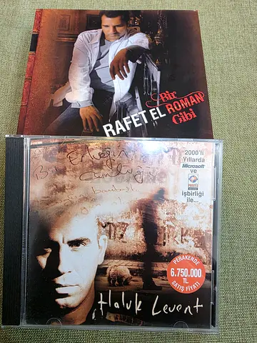 Collection of Rafet El Roman and Hakan Levent CDs