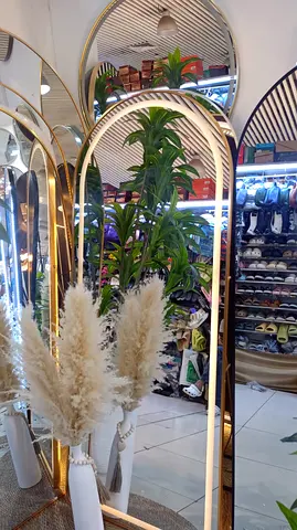 Stylish Arched LED Mirror with Elegant Decor