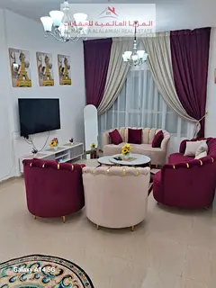 for rent monthly A fully furnished Two-bedroom 3-bathroom apartment in Al Taawun 1